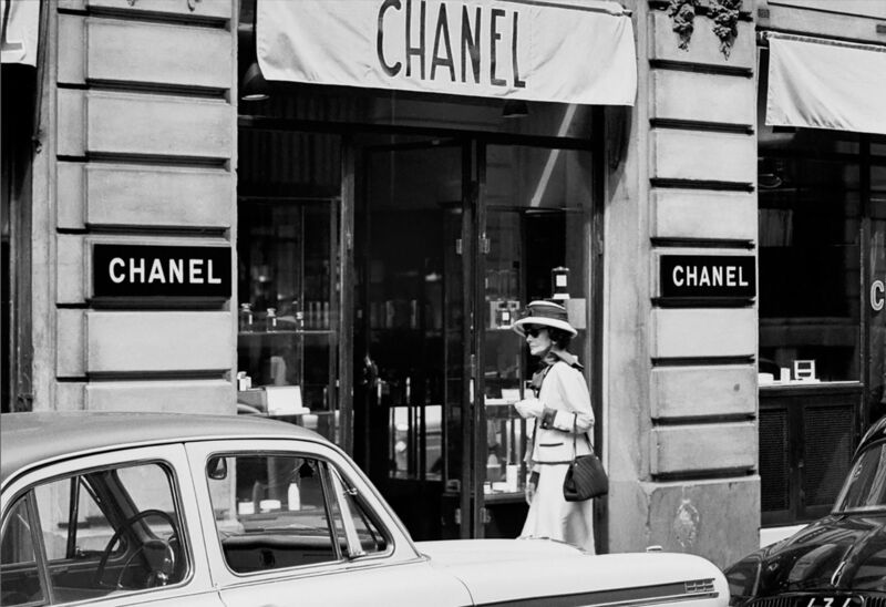 Douglas Kirkland | Coco Chanel, Enters Atelier at 31 Rue Cambon Paris 1962  (1962) | Available for Sale | Artsy