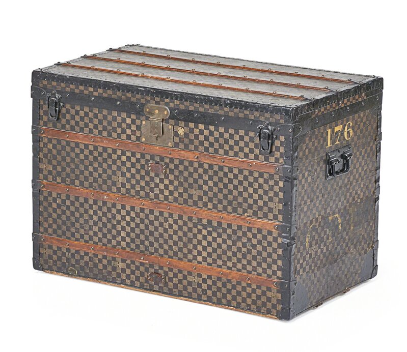 Lot - LOUIS VUITTON STEAMER TRUNK Exterior with allover LV monogram,  beechwood slats, brass locks and hardware, and original casters. One