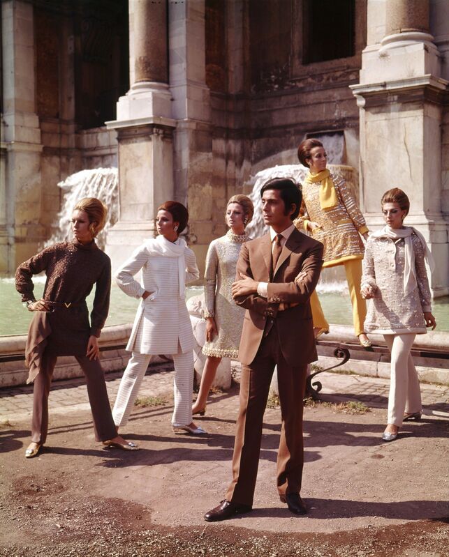 Valentino posing with models nearby Trevi Fountain. (1967) | Artsy