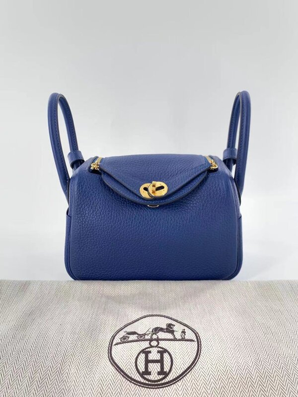 HERMÈS  DEEP BLUE MINI LINDY OF CLEMENCE LEATHER WITH GOLD