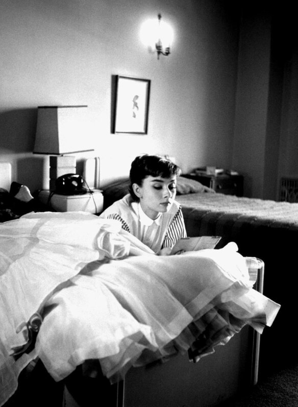 Audrey Hepburn on X: Audrey Hepburn photographed with her Louis