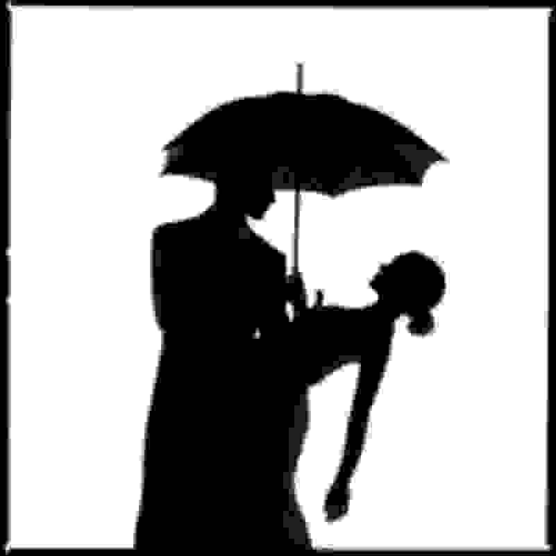 black silhouette couple under umbrella