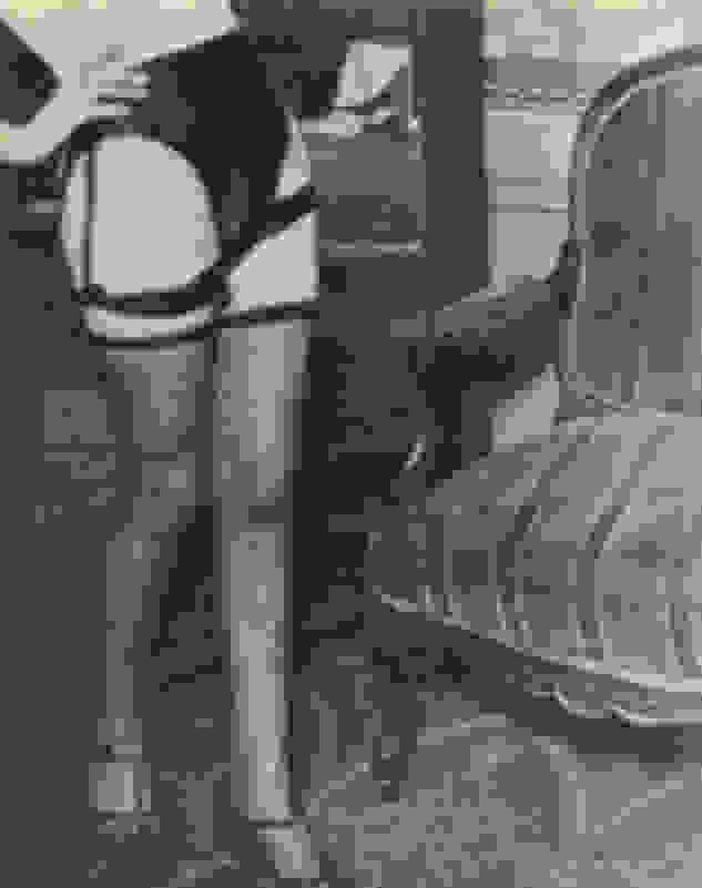Brassaï, Female Model in Net Stocking and Leather Panties (1932c/1932c)
