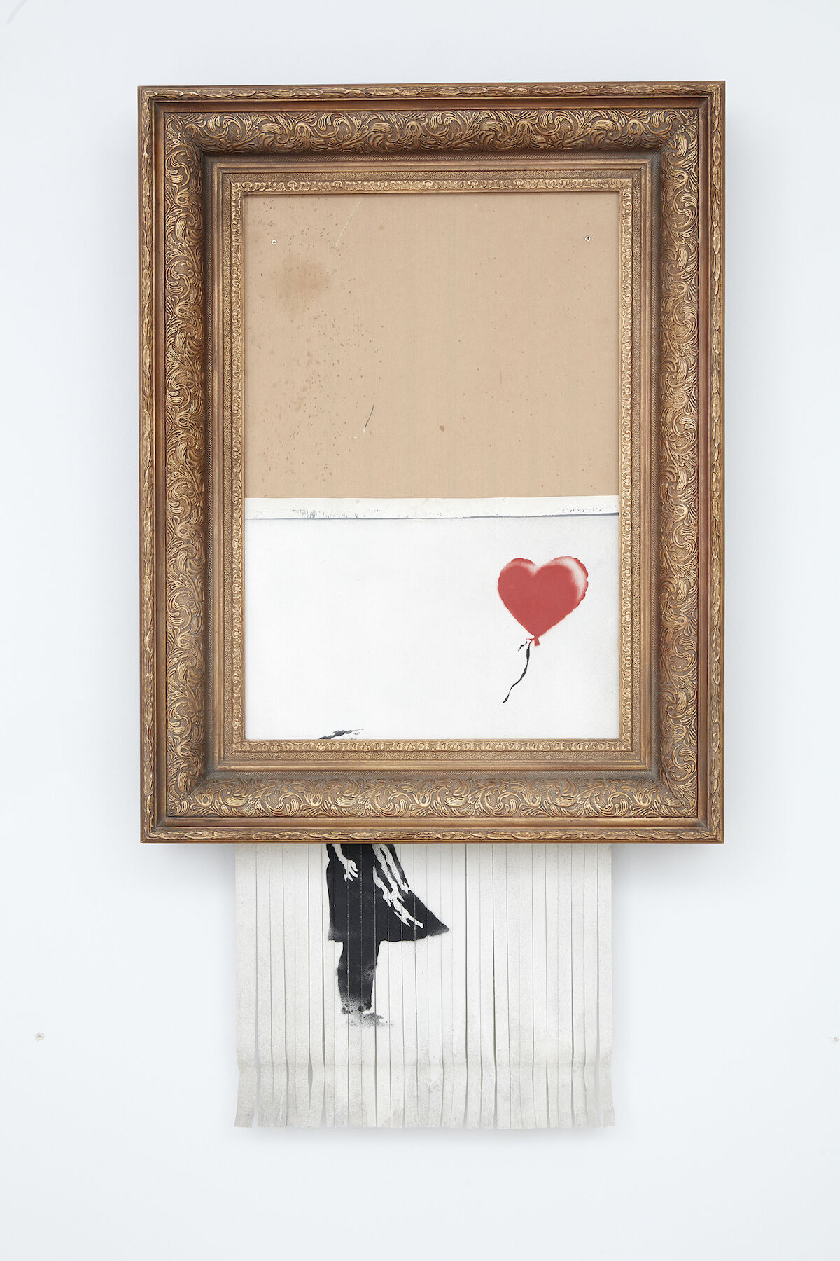 An Artwork By Banksy Shredded Itself After Selling For 1 3 Million At Sotheby S