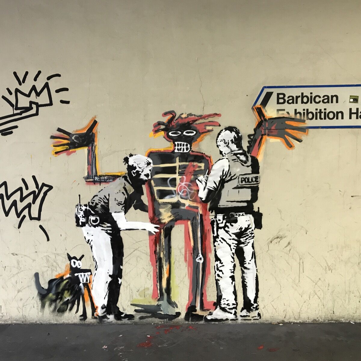 Banksy, Basquiat being “stopped-and-frisked” outside the Barbican Centre, 2017. Photo by Ungry Young Man, via Flickr.