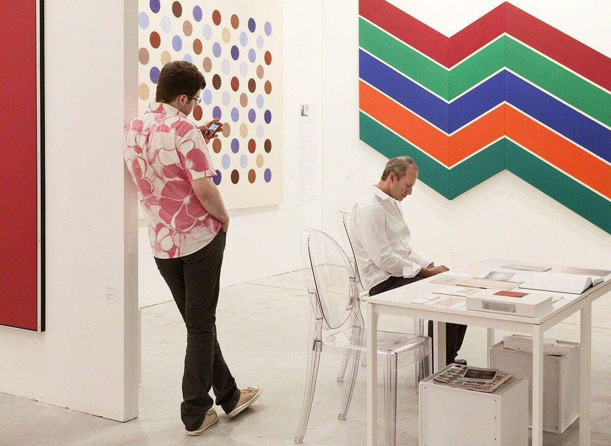 A detailed view of a small art piece inviting intimate engagement