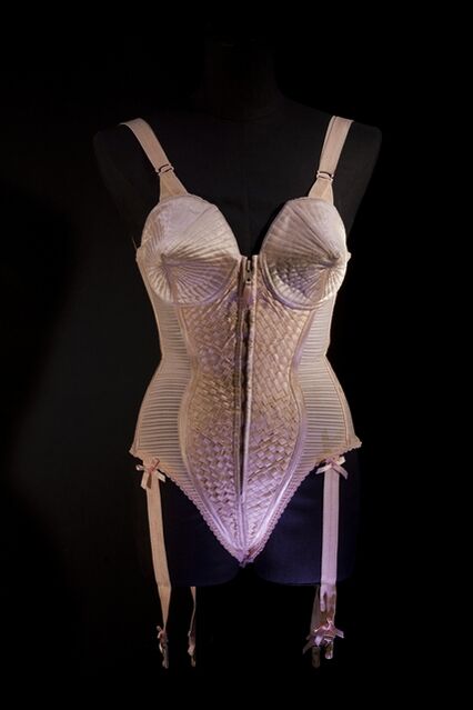 Jean Paul Gaultier | Corset-style body suit with garters, worn by Madonna during the “Metropolis” (“Express Yourself”) sequence of the Blond Ambition World Tour (1990) Jean Paul Gaultier | Corset-style body suit with garters, worn by Madonna during the “Metropolis” (“Express Yourself”) sequence of the Blond Ambition World Tour (1990)