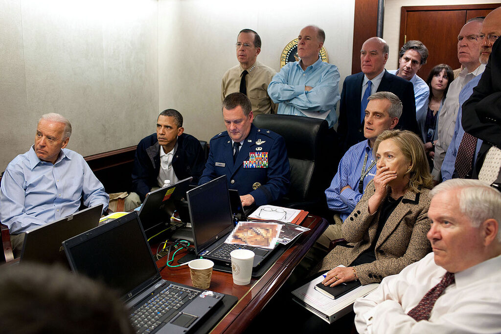 President Barack Obama and Vice President Joe Biden, along with members of the national security team, receive an update on the mission against Osama bin Laden in the Situation Room of the White House, 2011. Photo by Pete Souza. Courtesy of the White House Photo Office via Flickr. 