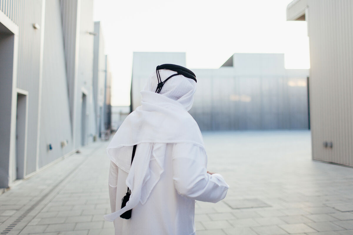 Portrait of Abdelmonem Bin Eisa Alserkal standing outside of the OMA-designed space, Concrete, on Alserkal Avenue, Dubai, by Anna Maria Nielsen for Artsy. 