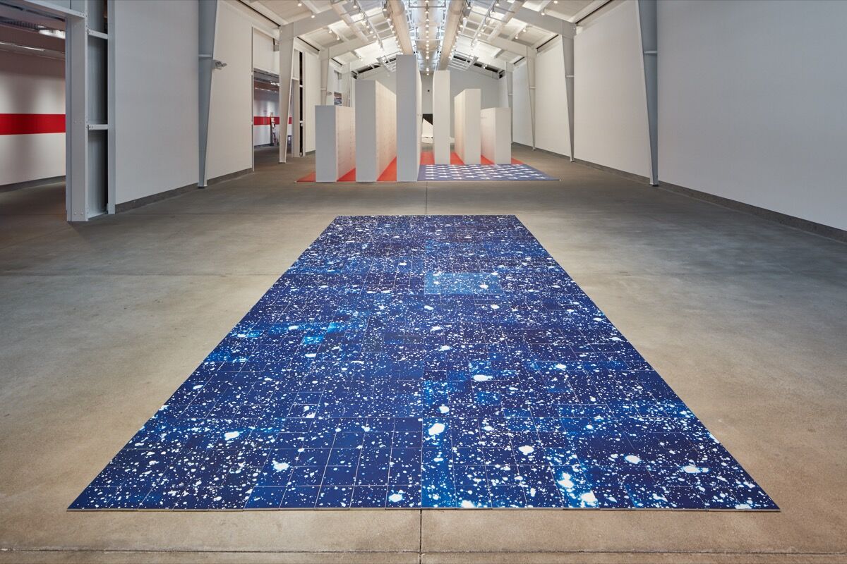 Installation view of Ala Ebtekar, Luminous Ground , 2018, and Rigo 23 Madre Tierra (Mother Earth) , 2018, in“Be Not Still: Living in Uncertain Times (Part 1),” at the di Rosa Center for Contemporary Art. Photo by Johanna Arnold. Courtesy of the di Rosa Center for Contemporary Art.