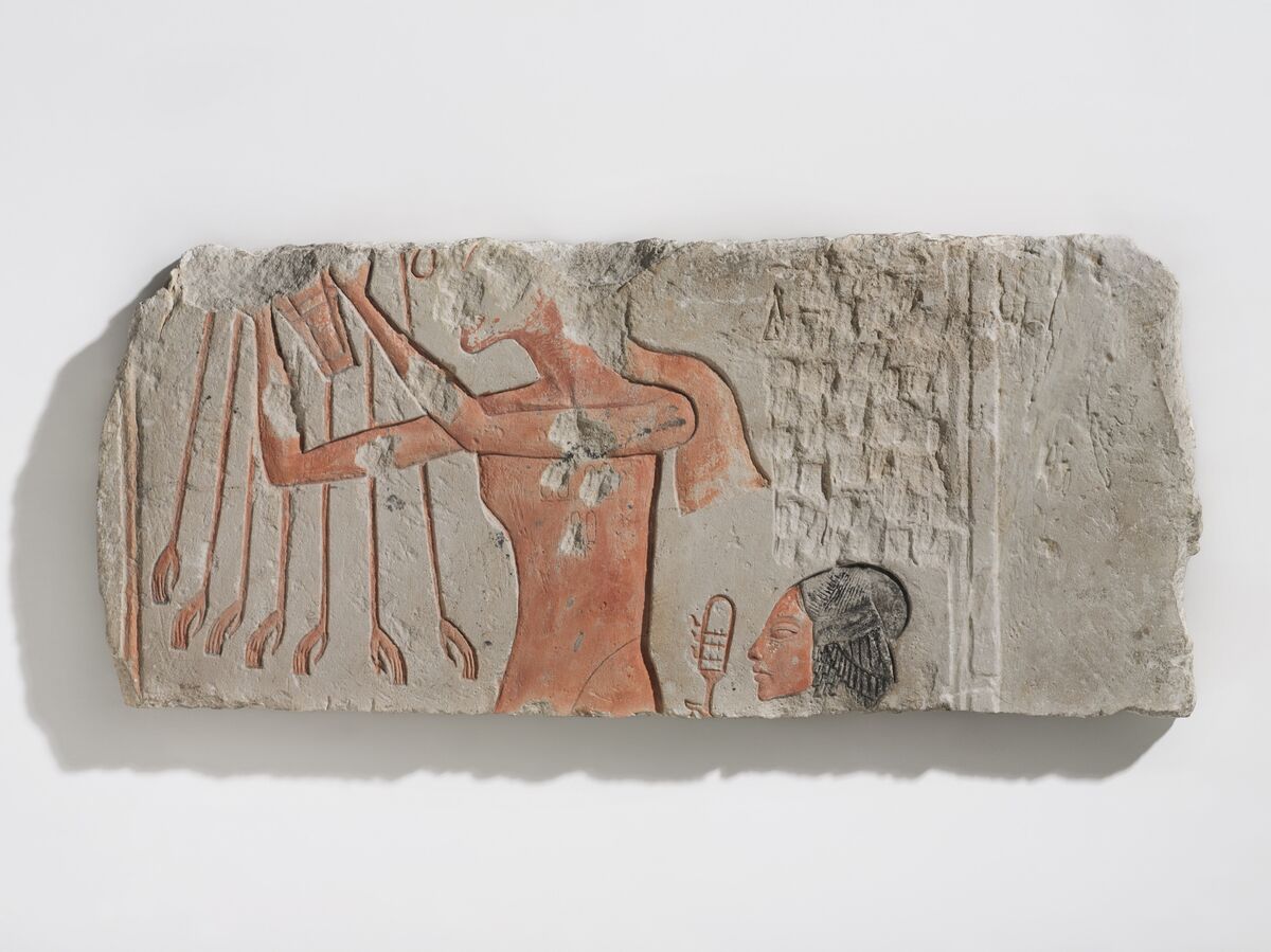 Akhenaten and His Daughter Offering to the Aten, ca. 1353–36 B.C.E. Courtesy of the Brooklyn Museum.