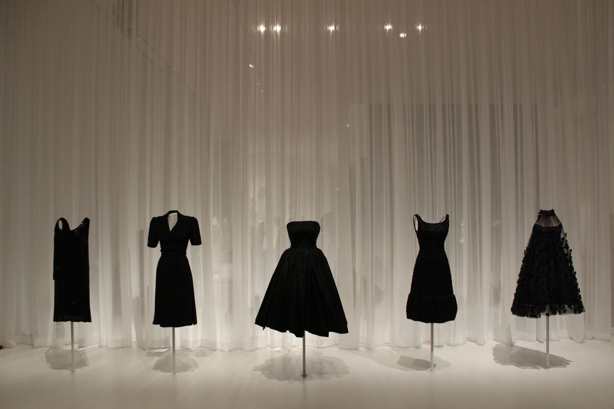 Installation view of designs by Gabrielle &quot;Coco&quot; Chanel (1925-27), Charles Creed (1942), Christian Dior (ca.1950), Hubert de Givenchy (1968), and Arnold Scaasi (ca.1966) at Items: Is Fashion Modern. Photo by Sarah Dotson. 