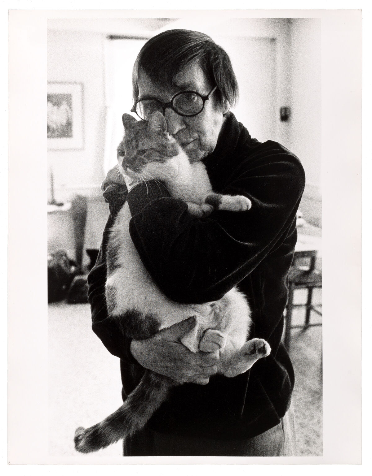Berenice Abbott holding a cat. Image from Artful Cats  by Mary Savig, published by the Smithsonian’s Archives of American Art, 2019. Courtesy of the publishers.