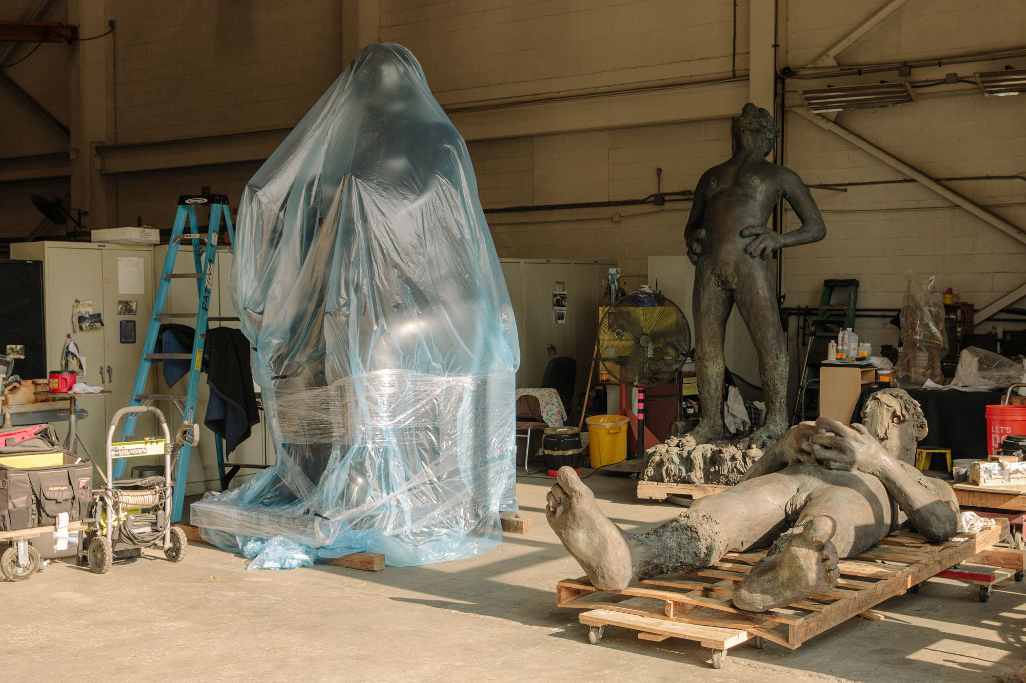 Works by Fernando Botero and Nicole Eisenman in the Polich Tallix art foundry. Photo by Ricky Rhodes for Artsy.