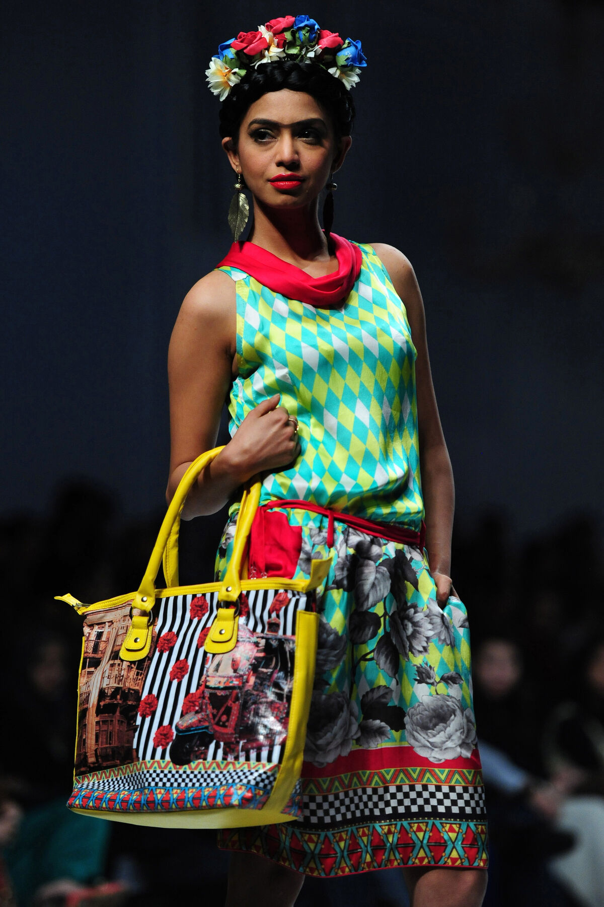 A Pakistani model presents a creation by Deepak Perwani on the second day of Fashion Pakistan Week, Karachi, 2013. Photo by Asif Hassan/AFP/Getty Images.