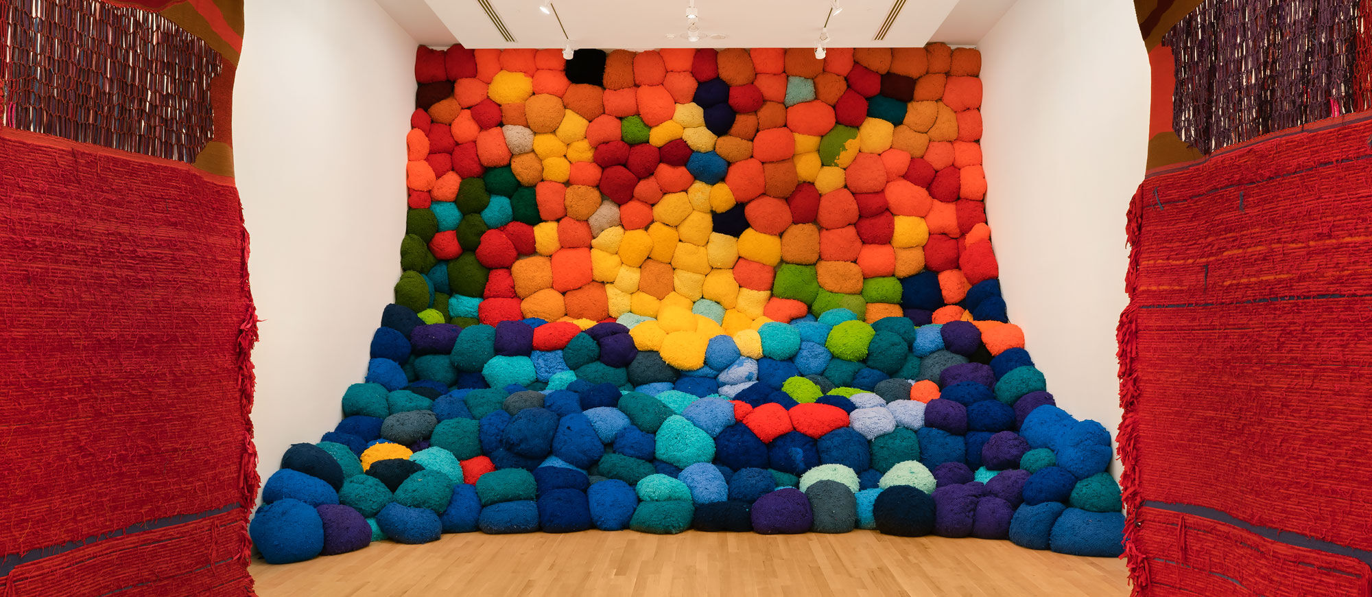 Installation view of Sheila Hicks, Escalade Beyond Chromatic Lands, 2016–17, at The Bass, 2019. Photo by Zachary Balber. Courtesy of The Bass, Miami Beach.