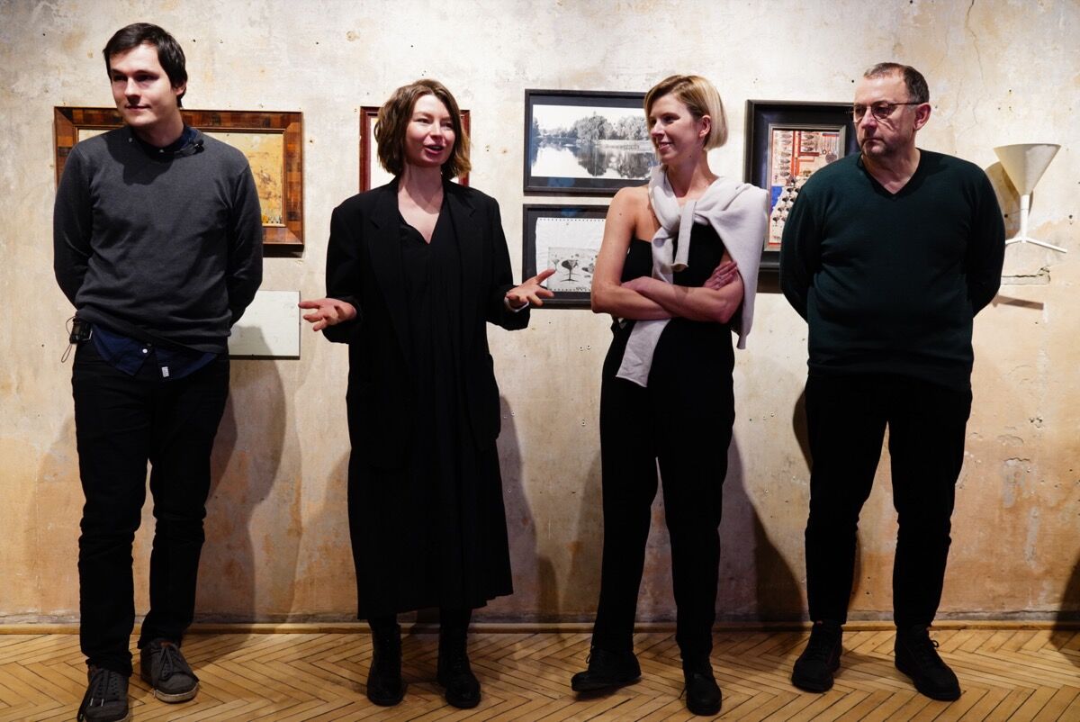 Portrait, from left to right, of Borys Filonenko, Lizaveta German, Maria Lanko, and Pavlo Makov presenting the project of the pavilion of Ukraine for the 59th Venice Biennale, 2022. Courtesy of Katya Pavlevych. 