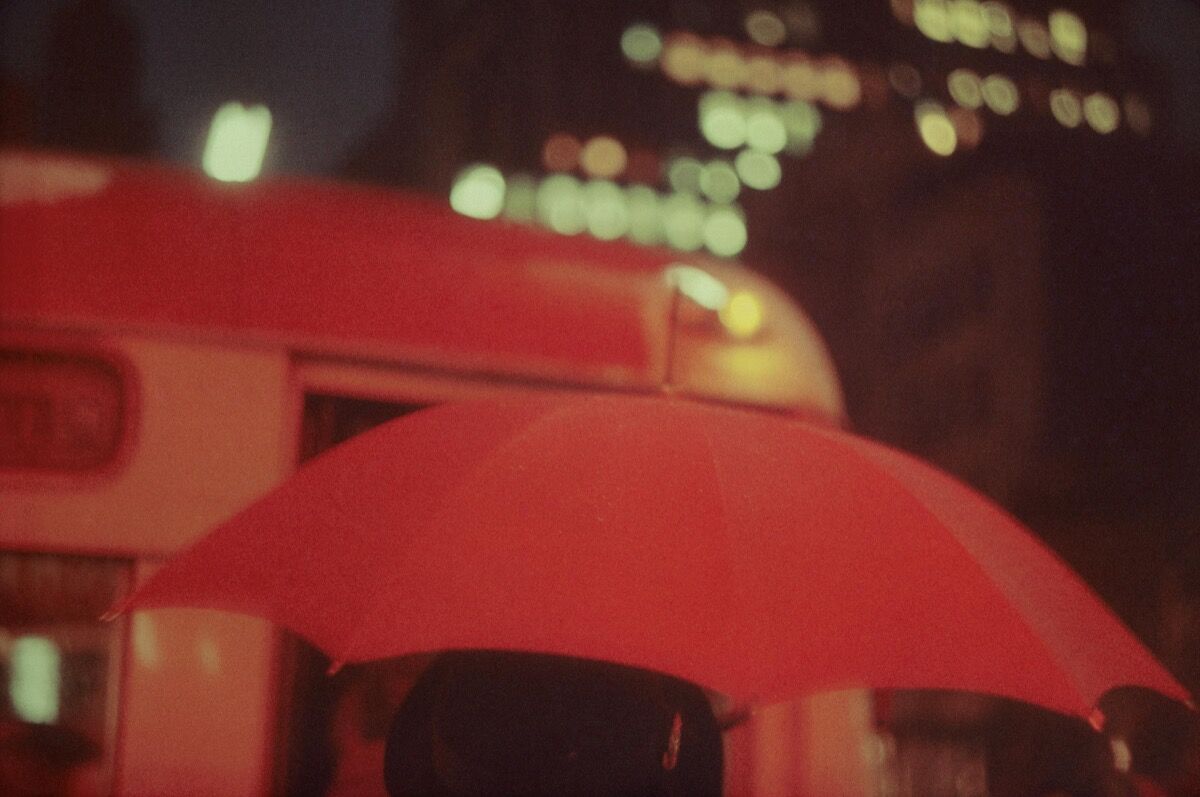 Saul Leiter, Red Umbrella, 1951, from “Early Color.” Courtesy of Steidl.