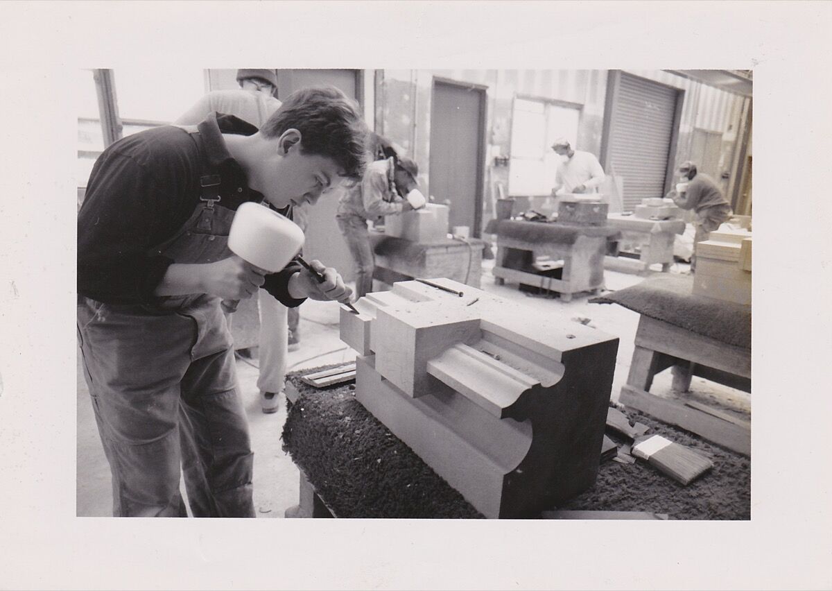 Chris Pellettieri working in the stone-carving studio. Courtesy of the artist.