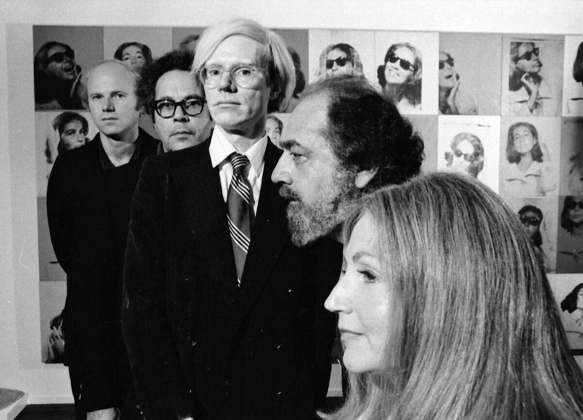 Andy Warhol photographed with art collectors Ethel and Robert Scull, sculptor George Segal, and painter James Rosenquist at the Scull's residence in 1973. (Photo by Jack Mitchell/Getty Images)
