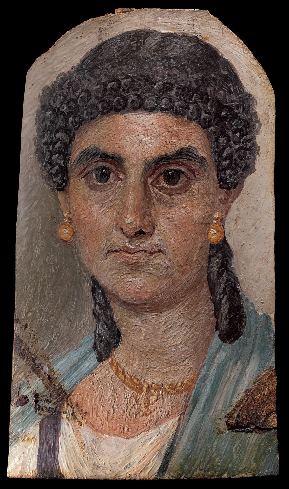 Panel painting of a woman in a blue mantle, 54–68. C.E. Courtesy of The Metropolitan Museum of Art.