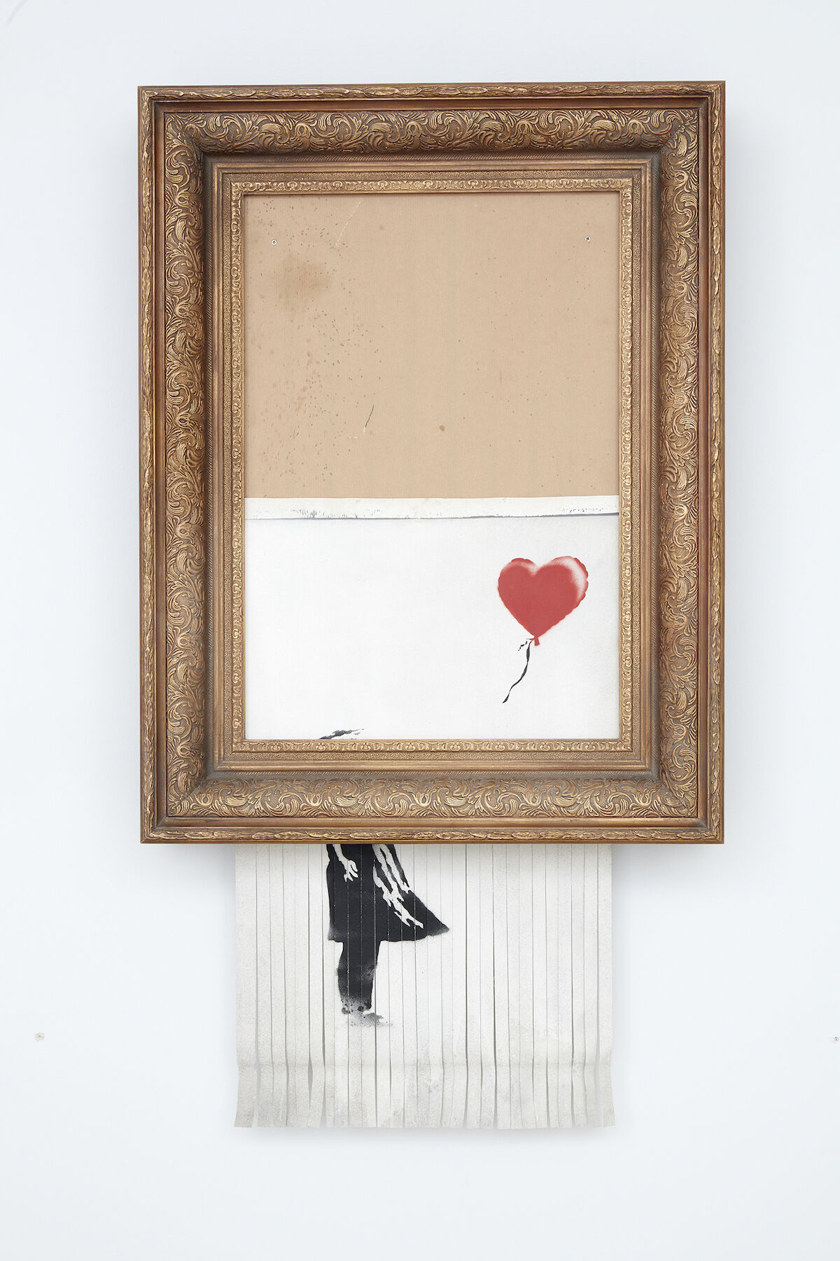 banksy s half shredded painting will go on view at a german museum