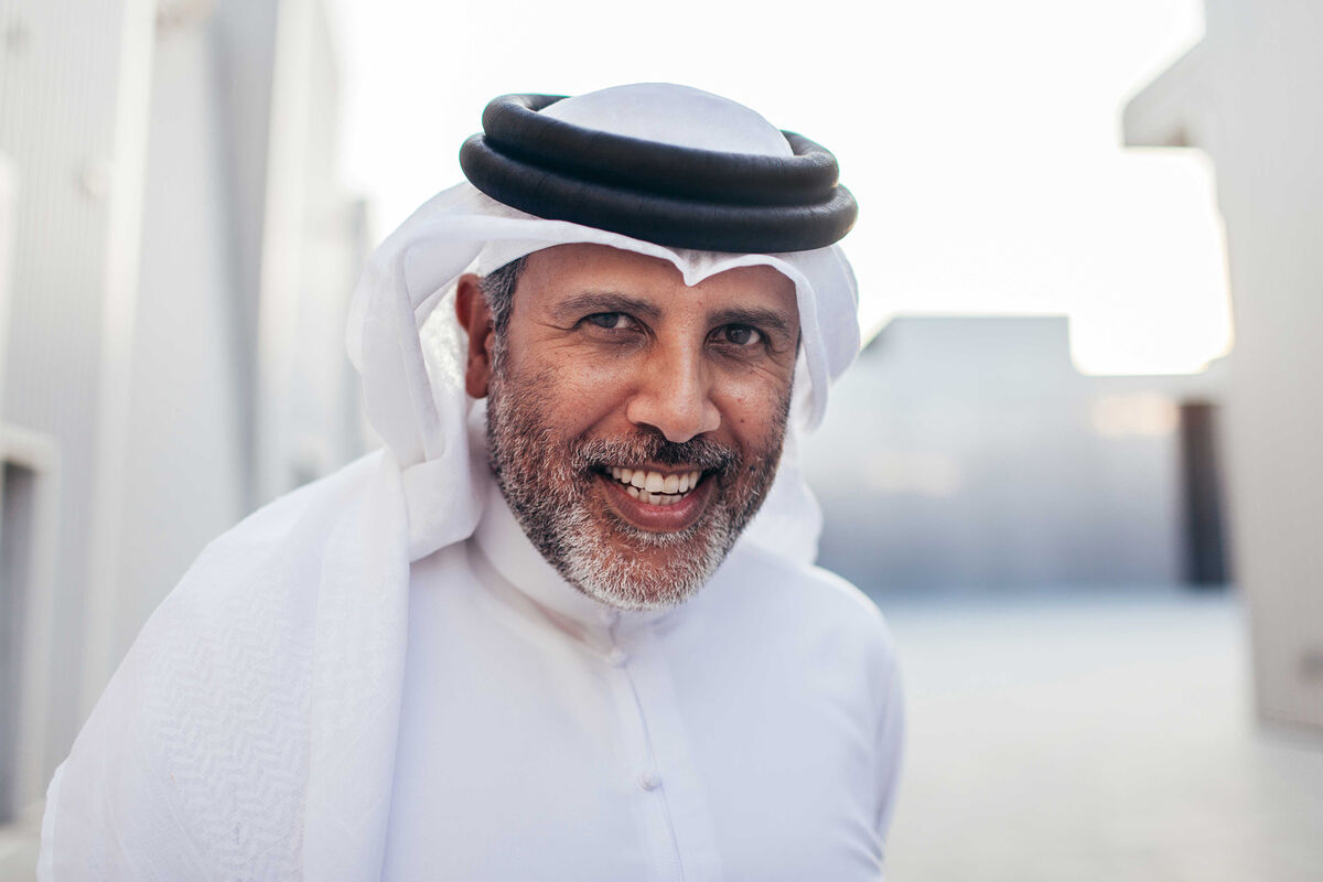 Portrait of Abdelmonem Bin Eisa Alserkal standing outside of the OMA-designed space, Concrete, on Alserkal Avenue, Dubai, by Anna Maria Nielsen for Artsy.