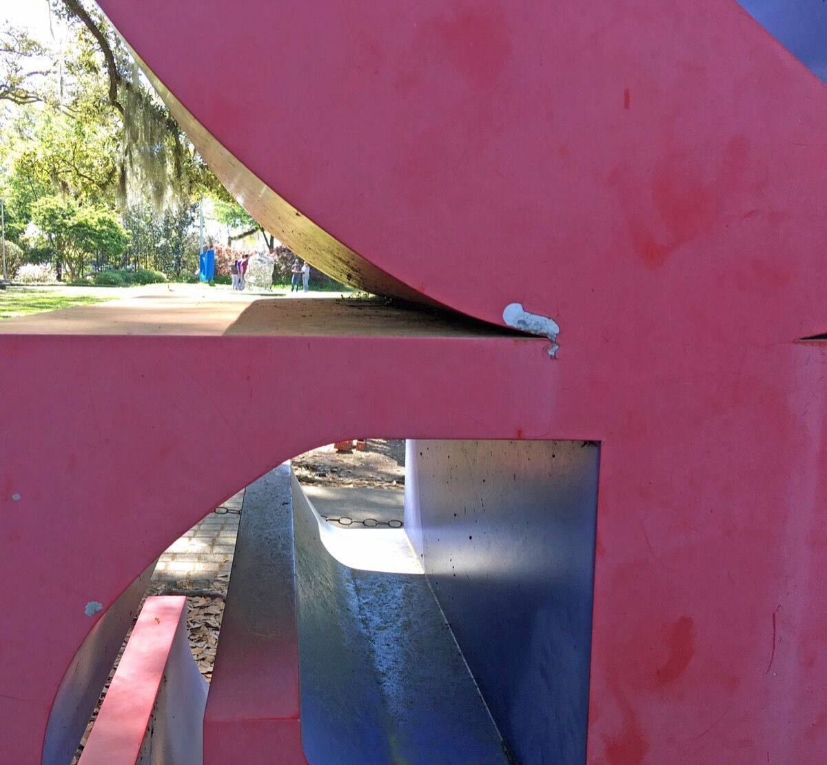 Flaking paint in a detail of Robert Indiana, LOVE (red outside violet inside), 1966-97. &nbsp;Courtesy of the New Orleans Museum of Art. 