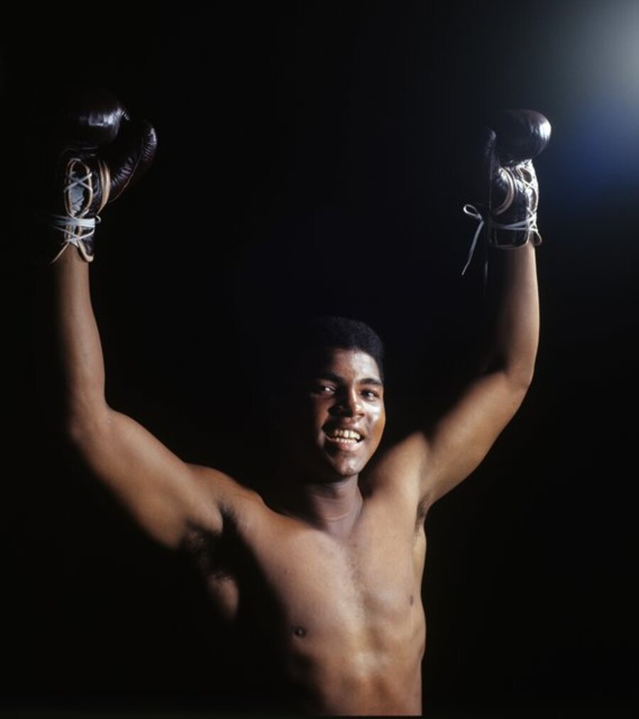 Ali with Arms Raised