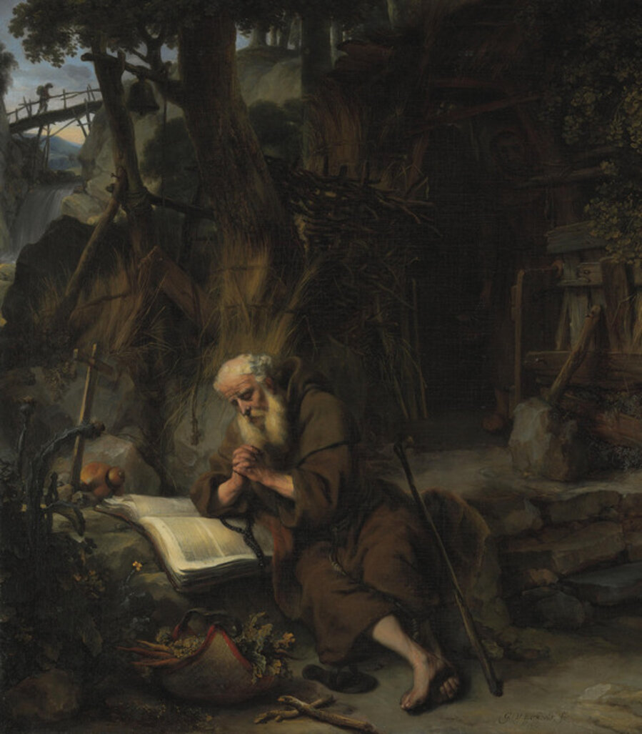 A hermit praying