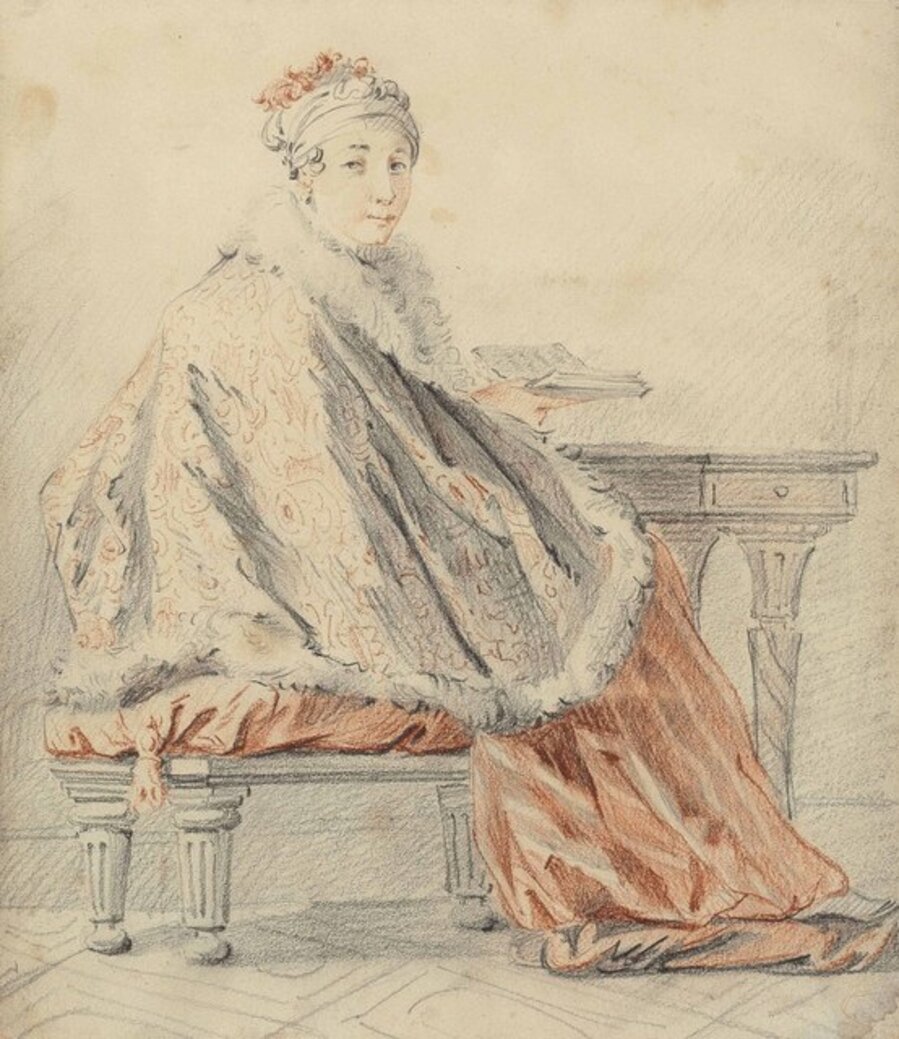 A lady seated at a table