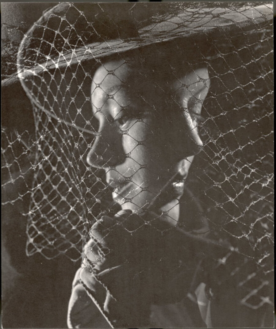Double Exposure of Models Wearing Hat with Heavy Face Veil