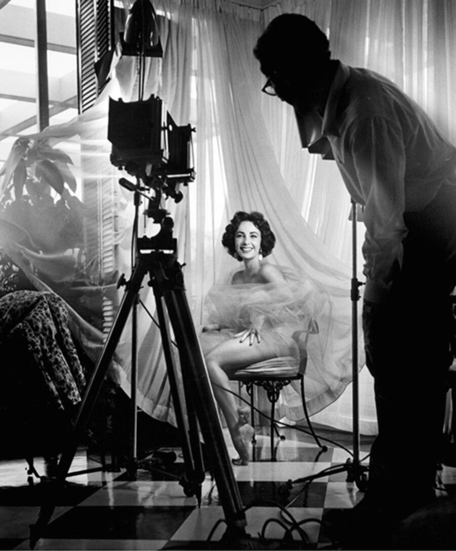 Elizabeth Taylor being photographed by English society photographer Anthony Beauchamp, Palm Springs