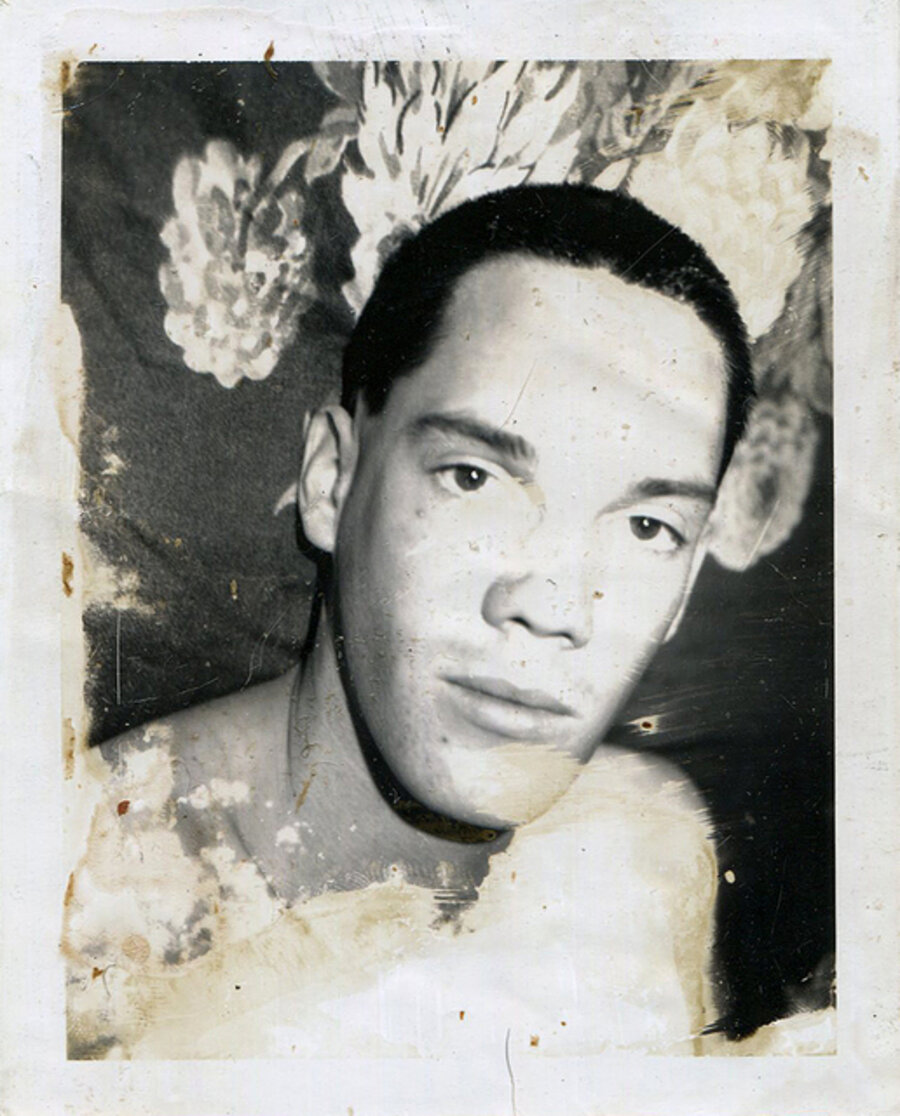 Untitled (Close up of Man in Front of Floral Fabric)