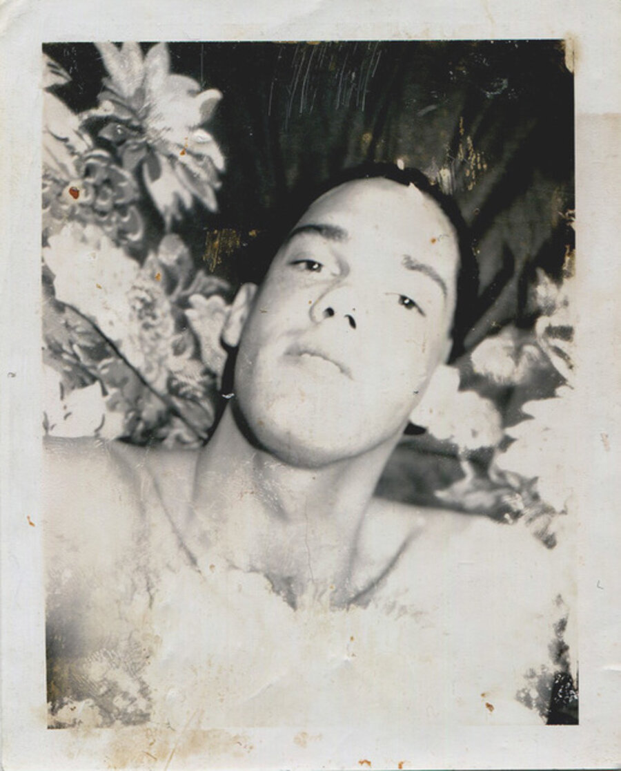 Untitled (Portrait of a Man in Front of Floral Fabric)