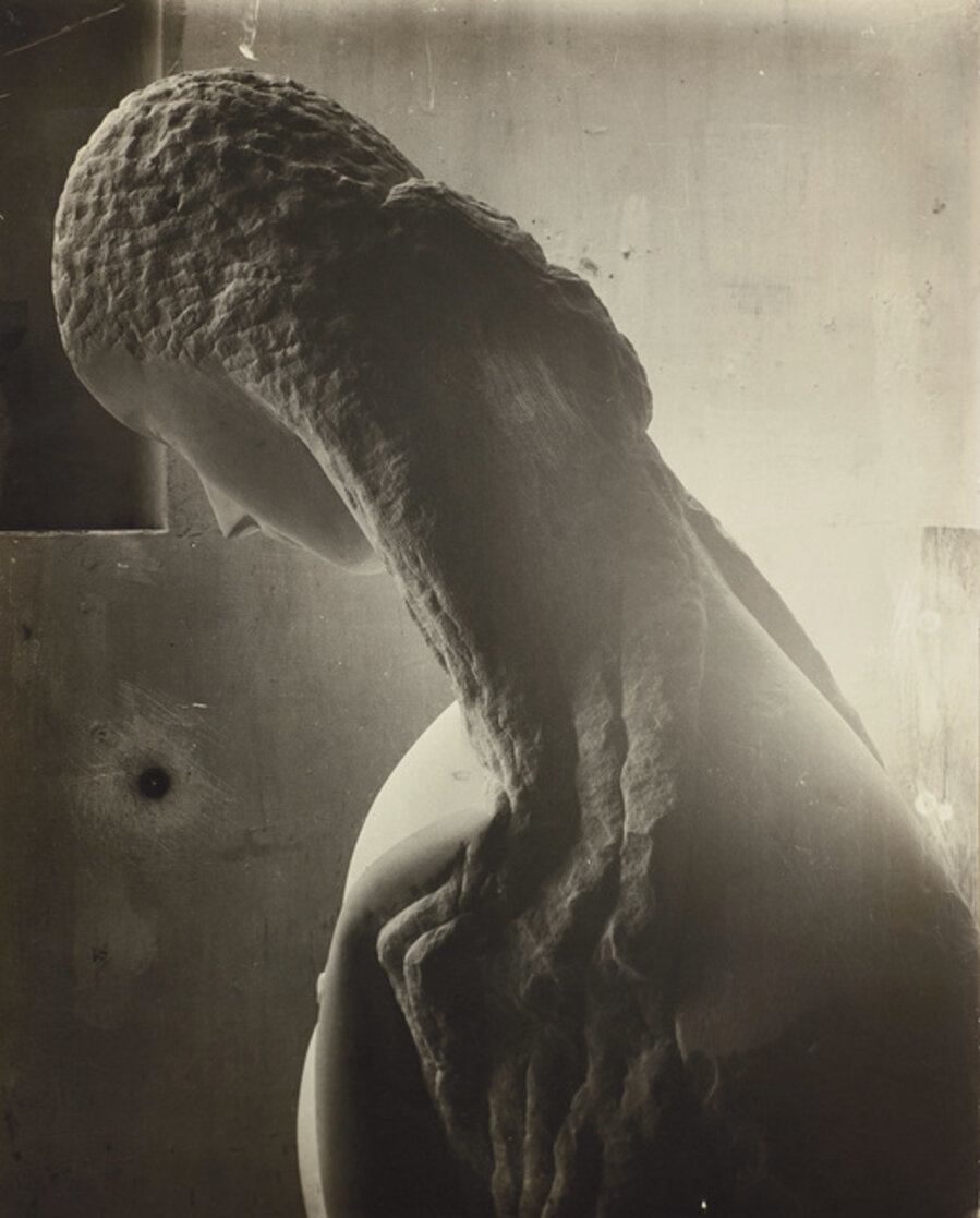 Woman Looking into a Mirror