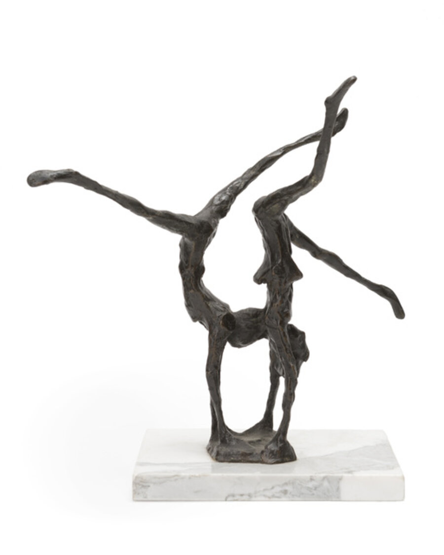 Two figures perfoming handstands