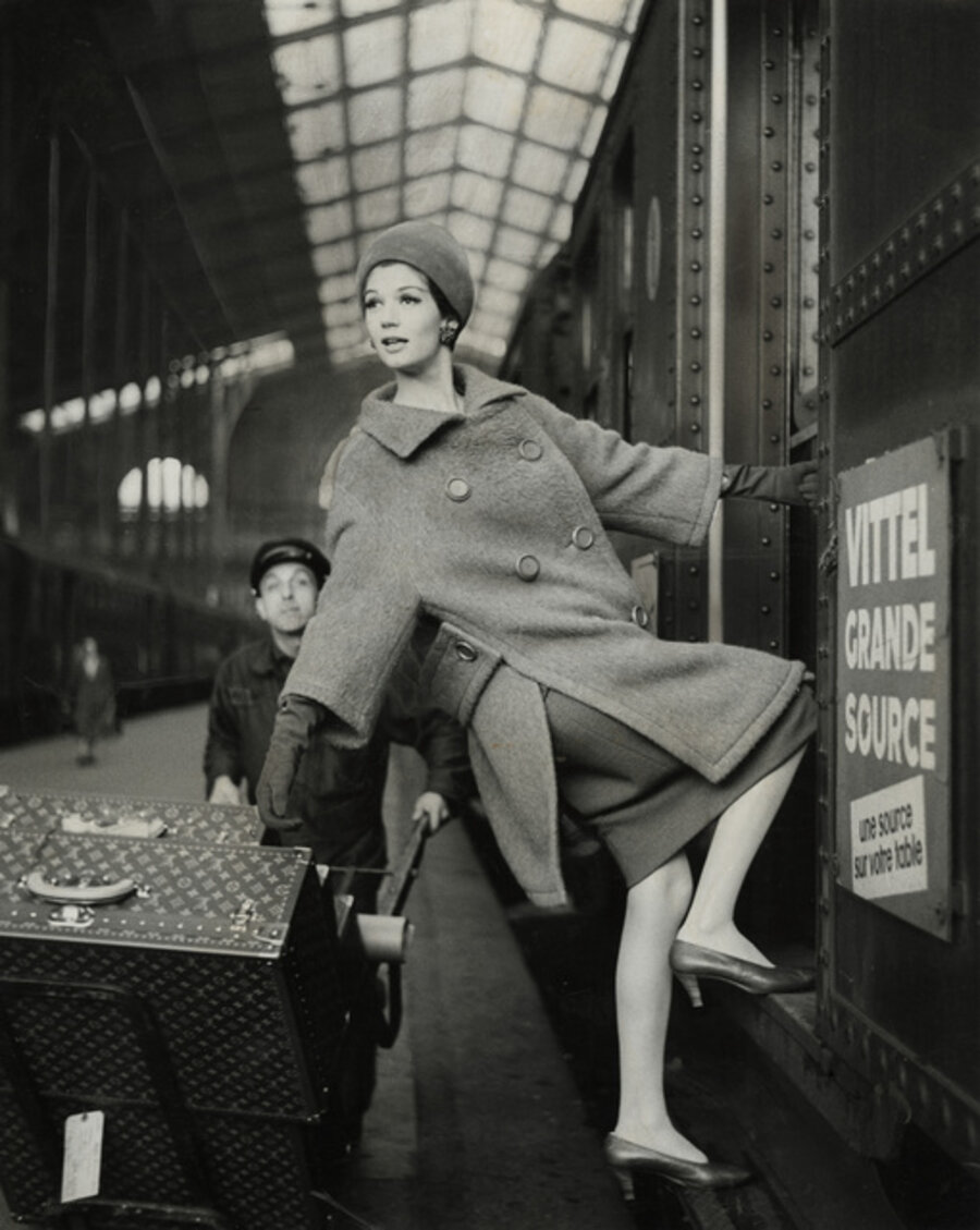 Model hanging out of Train Car