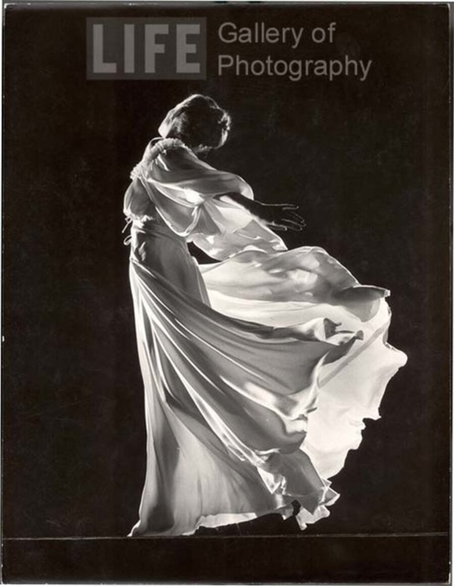 Model with Billowing Light Colored Sheer Nightgown and Peignoir (Face not Seen)