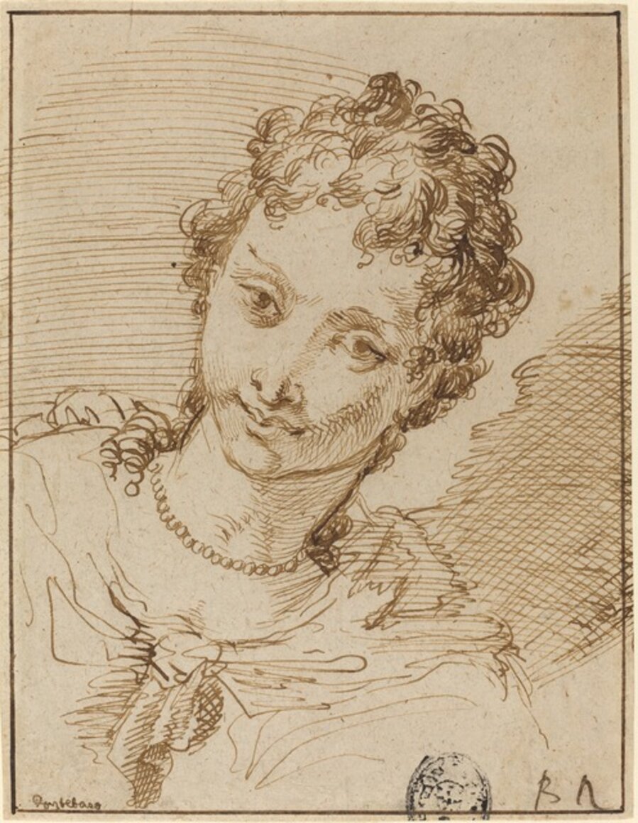 Elegant Young Woman with a Pearl Necklace
