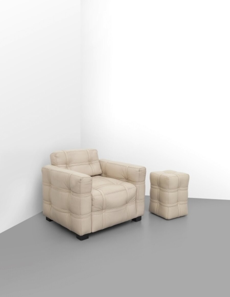 An armchair and ottoman