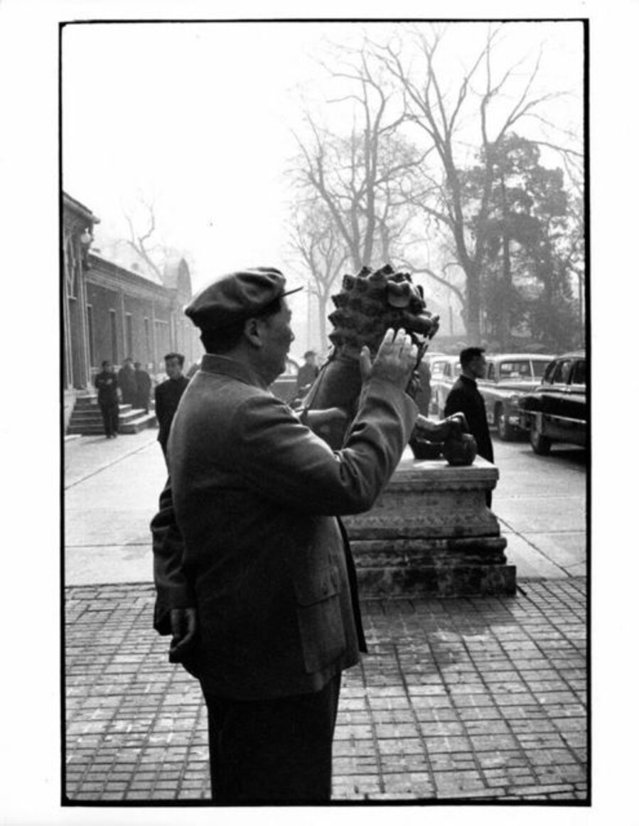 Chairman Mao strolling outside his official residence, Beijing