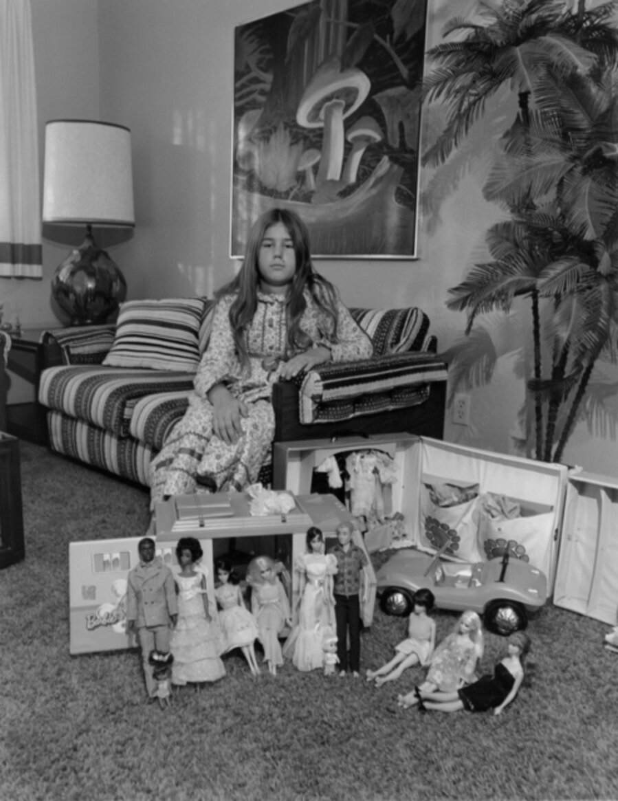This is Valerie's world in Miniature. She makes it what she wants it to be...without war, racial hate or misunderstanding. Ken and Barbie (dolls) are man and woman rather than Mom and Dad. They enjoy living and having a camper truck is the good life. Today Valerie has the chicken pox and can't go out and play.