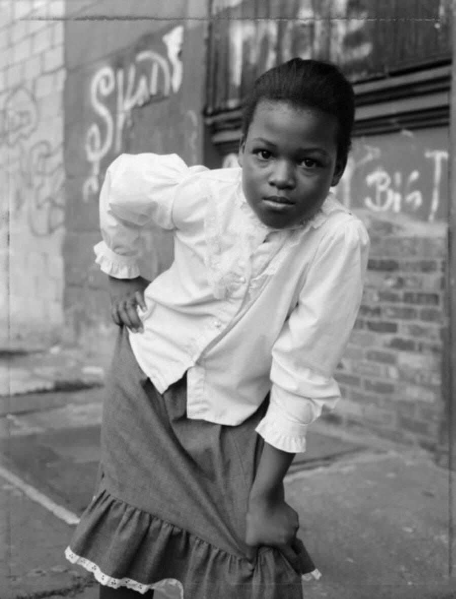 A Young Girl Striking a Pose