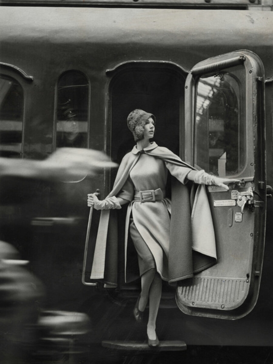 Model wearing Coat with Fur
