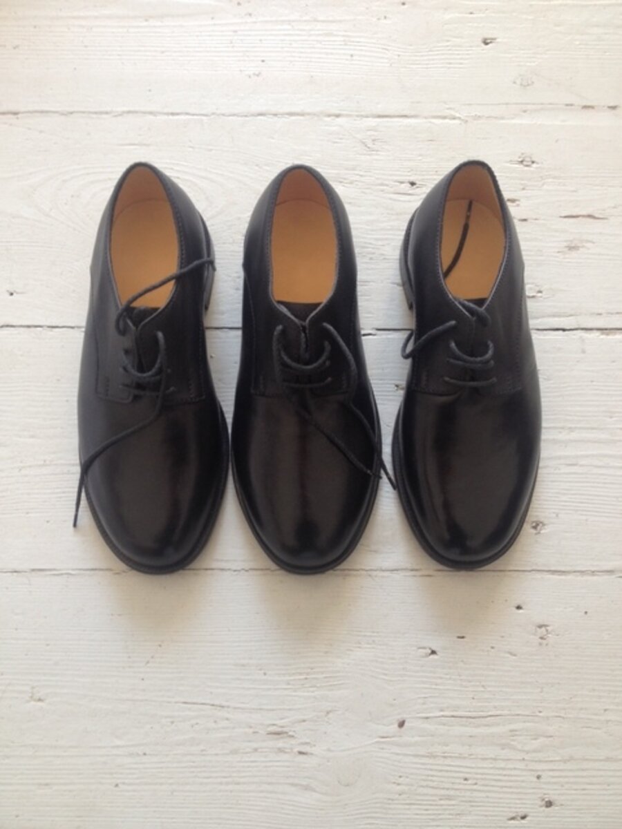 shoes that have been made for someone with three legs