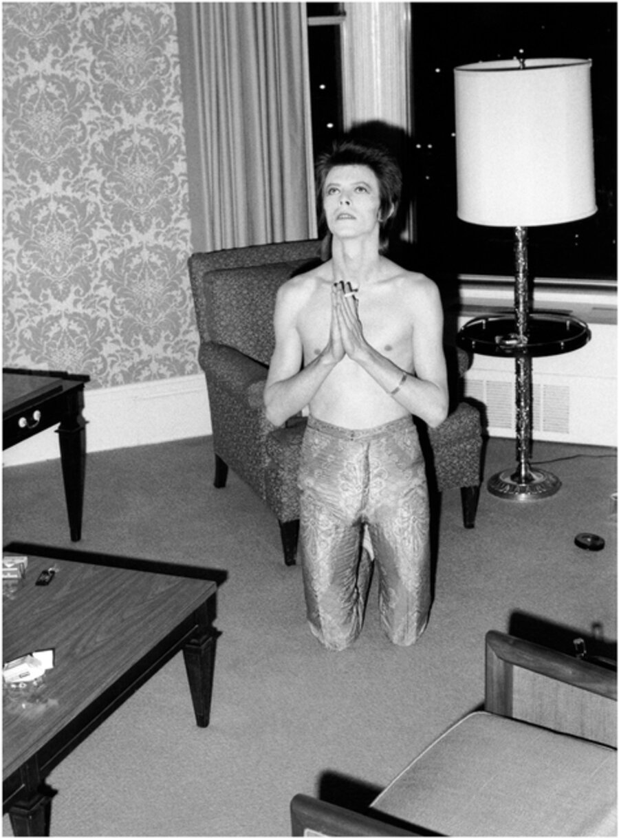 Bowie Praying on Knees