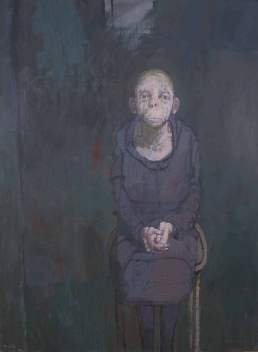 Femme Assise Dans La Penombre