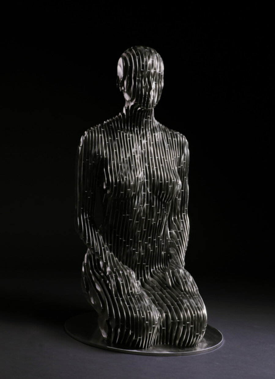 Kneeling Woman