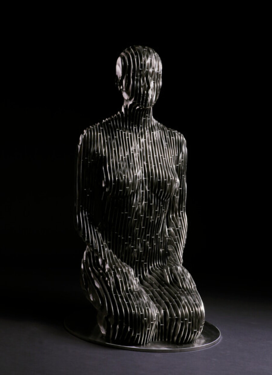 Kneeling woman